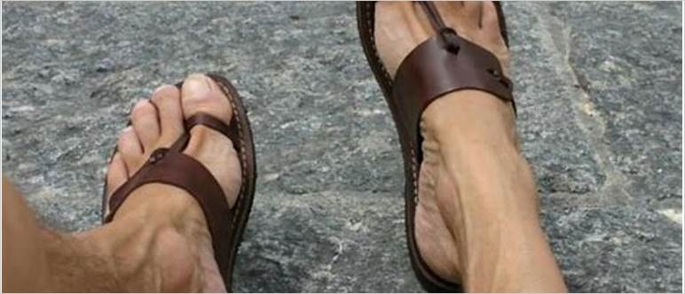 Male feet in sandals